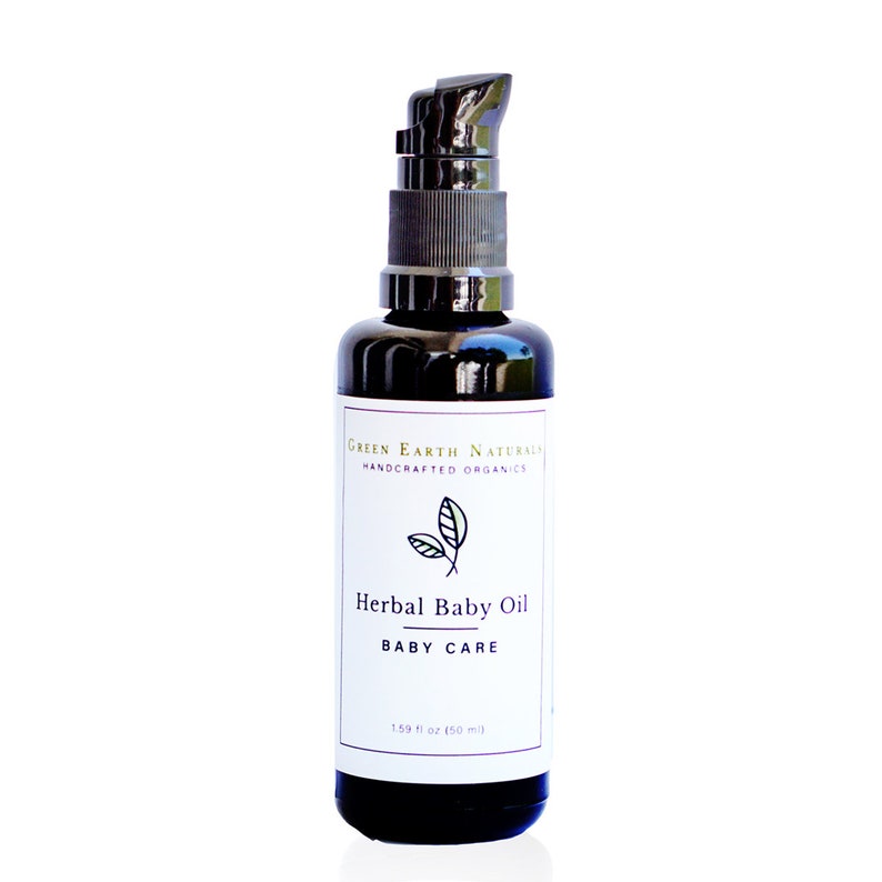 May include: A black glass bottle of Herbal Baby Oil with a pump dispenser. The label reads "GREEN EARTH NATURALS HANDCRAFTED ORGANICS" and "Herbal Baby Oil BABY CARE". The bottle contains 1.59 fl oz (50 ml) of oil.