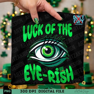 May include: Black digital file with the text "LUCK OF THE EYE-RISH" in green, featuring a green eye design. The image also includes a small leprechaun hat and a four-leaf clover. The file is labeled as a 300 DPI digital file.