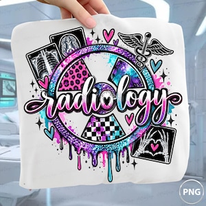 May include: A white t-shirt featuring a colourful graphic with the word radiology in cursive script. The design includes a radiation symbol with leopard print, galaxy, and checkerboard patterns, medical x-rays, a caduceus, and skeleton hands.