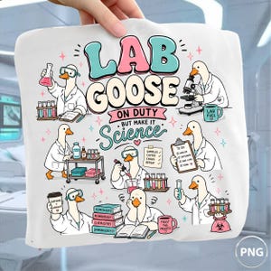 May include: A white graphic print featuring multiple cartoon geese dressed as scientists in lab coats. The text reads LAB GOOSE ON DUTY BUT MAKE IT SCIENCE. The geese are shown using microscopes, test tubes, clipboards, and books in a laboratory setting.