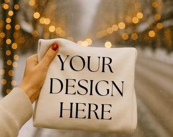Beige Folded Crewneck Mockup, Holiday Winter Street Scene (JPG)