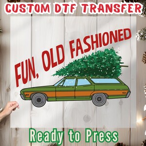 May include: A DTF transfer design featuring a green and orange station wagon with a Christmas tree on top. The words "FUN, OLD FASHIONED" are in red, and "Ready to Press" is in green.