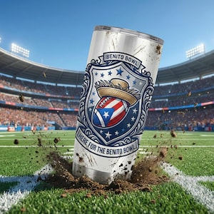 May include: A stainless steel tumbler with a design featuring a football with the Puerto Rican flag, a straw hat, and the words "BENITO BOWL" and "HERE FOR THE BENITO BOWL". The tumbler is on a football field.