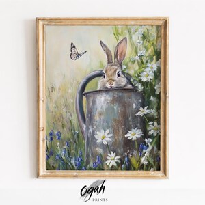 Op de afbeelding: Een witte keramische mok met een zwarte handgreep en de tekst "But First, Coffee" in een vetgedrukte, zwarte letter. De mok staat tegen een neutrale achtergrond, wat het eenvoudige ontwerp benadrukt.