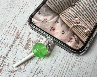 Tapón antipolvo con dije de piruleta: accesorio coqueto para teléfono