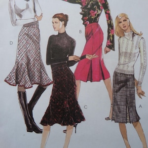 May include: An image featuring four different outfits. Each outfit includes a skirt, with various patterns and colors, paired with different tops. The skirts have a flared or A-line shape. The outfits are modeled on a white background.