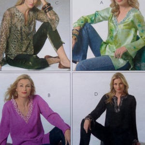 May include: Four different women's tops are displayed. The tops include a green floral print, a purple top, a black top, and a leopard print top. Each top has a V-neck design with decorative trim. The models are wearing jeans.