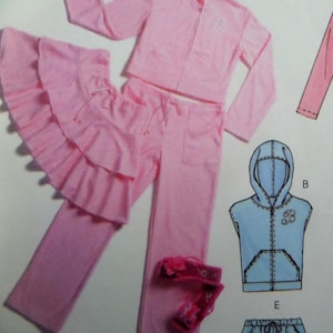 May include: A pink long-sleeve zip-up jacket, matching pants, and a skirt with three tiers of ruffles. A separate illustration shows a light blue sleeveless hooded vest with a letter B on the chest and a pair of pink sandals with floral accents.