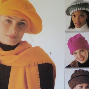 May include: A woman wearing a mustard yellow beret and scarf. The scarf has a stitched edge. Additional images show various hats, including a gray beret with white trim, a fuchsia beanie, and a brown hat with a dark brown brim.
