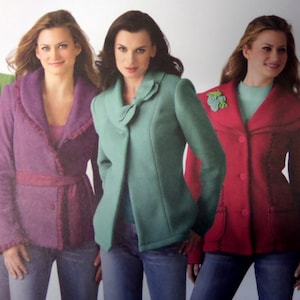 May include: Three jackets in purple, teal, and red. The purple jacket has a ruffled collar and waist tie. The teal jacket features a bow detail at the neckline. The red jacket includes a decorative floral brooch and visible stitching.