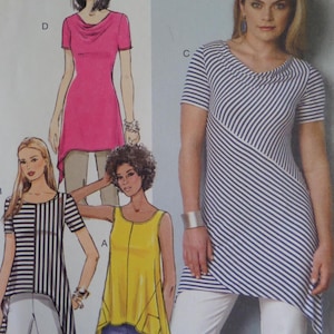 May include: A sewing pattern featuring illustrations of various tunic tops. The designs include a pink tunic with a cowl neck, a yellow asymmetrical top, and a striped tunic with a diagonal design. The models are wearing the tops with pants.