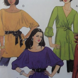 May include: A sewing pattern illustration featuring three tops: a mustard yellow tunic with a black sash, a lime green wrap-style top with long gathered sleeves and a tie waist, and a deep purple top with a wide neckline and elasticized sleeves.