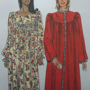 May include: Two long-sleeved robes shown in a sewing pattern illustration. One robe is cream-colored with a red and blue floral print, featuring a gathered yoke and ruffled cuffs. The second robe is solid red with a button-front and ruffled trim.