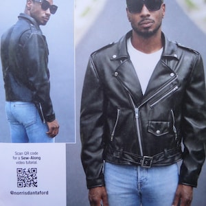 May include: A black motorcycle jacket featuring a notched lapel, silver-tone metal zippers, a front belt with a buckle, and shoulder epaulets. The jacket is worn over a white t-shirt and blue jeans. Includes a QR code for a Sew-Along video tutorial.