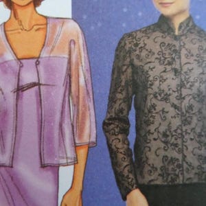 May include: A lilac-colored outfit with a sheer, button-up jacket and a matching top. Next to it is a black lace jacket with a mandarin collar and long sleeves. The garments are displayed against a blue background.