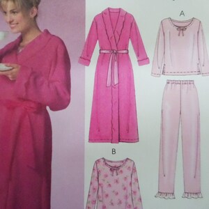 May include: A pink robe with a matching belt is displayed next to a pink pajama set. The pajama set includes a long-sleeved top and pants. A second pajama set with a floral print is also shown. The image is a pattern for sleepwear.