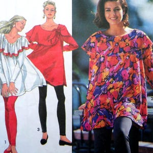 May include: A sewing pattern illustration featuring three tunic tops. One is a white long-sleeve tunic with a ruffled neckline, one is a solid red long-sleeve tunic with a side bow, and one is a multi-colored floral print tunic with a ruffled neckline.