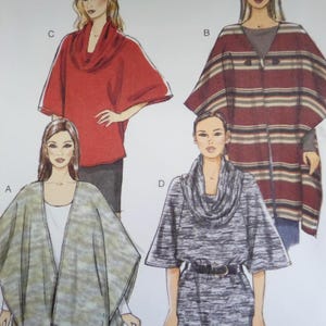 May include: A sewing pattern illustration featuring four poncho designs. Design A is a light green mottled open poncho. Design C is a solid red cowl-neck poncho. Design B is a striped brown and tan poncho with a toggle closure. Design D is a grey cowl-neck poncho with a black belt.