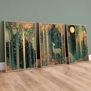 May include: Three rectangular framed wall art prints featuring a forest scene with tall trees, golden circular accents, and a deer in the centre panel. The artwork uses a colour palette of deep teal, dark green, and gold, enclosed in light wood frames.