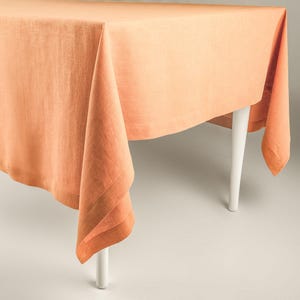 Large linen tablecloths, Peach tablecloths, Custom tablecloths with elegant hems in various colors, Tailored table linens for modern homes