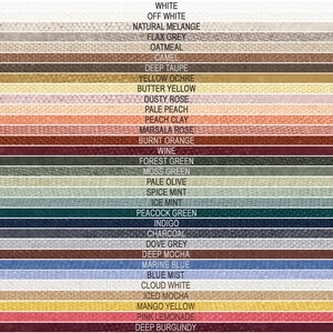 May include: A color chart featuring a variety of fabric swatches. The swatches display a range of colors, including white, off-white, gray, beige, brown, yellow, pink, orange, red, green, blue, and purple. Each swatch is labeled with its corresponding color name.