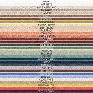 May include: A fabric colour chart showing a spectrum of hues. The swatches include shades like white, grey, beige, brown, yellow, pink, orange, red, green, blue, and purple. Each colour is identified with a label, such as 'White', 'Camel', and 'Indigo'.