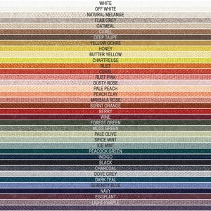 May include: A color chart with 28 fabric swatches, showing a variety of colors from white to light purple. The colors are arranged in rows, with the names of each color listed above the corresponding swatch.