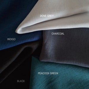 May include: Five fabric swatches in different colors: indigo, black, charcoal, dove grey, and peacock green.