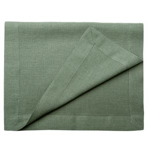 May include: A sage green linen placemat with a folded corner, showing a detailed hem. The fabric has a textured appearance, suggesting a natural fibre. The placemat is rectangular and appears to be new.