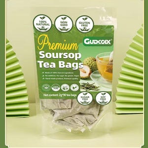 May include: A clear plastic bag of Premium Soursop Tea Bags. The bag features the text "Premium Soursop Tea Bags" and icons indicating the tea is natural, non-GMO, and gluten-free. The net content is 2g*90 tea bags.