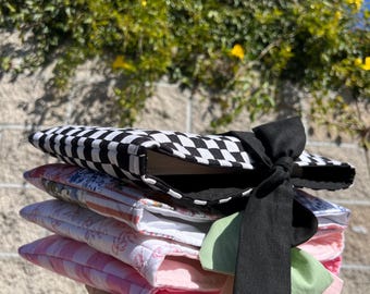 Assorted book/kindle sleeves