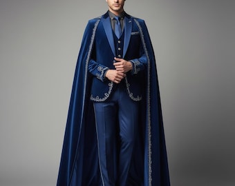 May include: A formal navy blue suit with a matching cape. The suit includes a jacket, vest, and trousers. The cape and suit are trimmed with silver embroidery. The person is wearing a navy blue tie and black dress shoes.