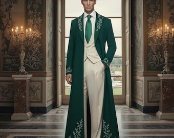May include: A formal ensemble featuring a long, emerald green coat with white floral embroidery, paired with a cream-colored vest and trousers. The outfit includes a green tie and is set in a grand, ornate interior.