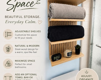 May include: A spa-inspired bamboo shelf unit with three shelves, holding rolled black and gray towels. The unit is in a bathroom setting, with text that reads "Elevate Your Space" and "Bring the Spa Home."