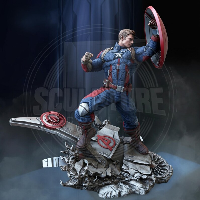 May include: A detailed figurine of Captain America in a dynamic pose, holding his shield. The figure is clad in a blue, red, and white costume, standing on a detailed base with the Avengers logo. The shield is red and white.