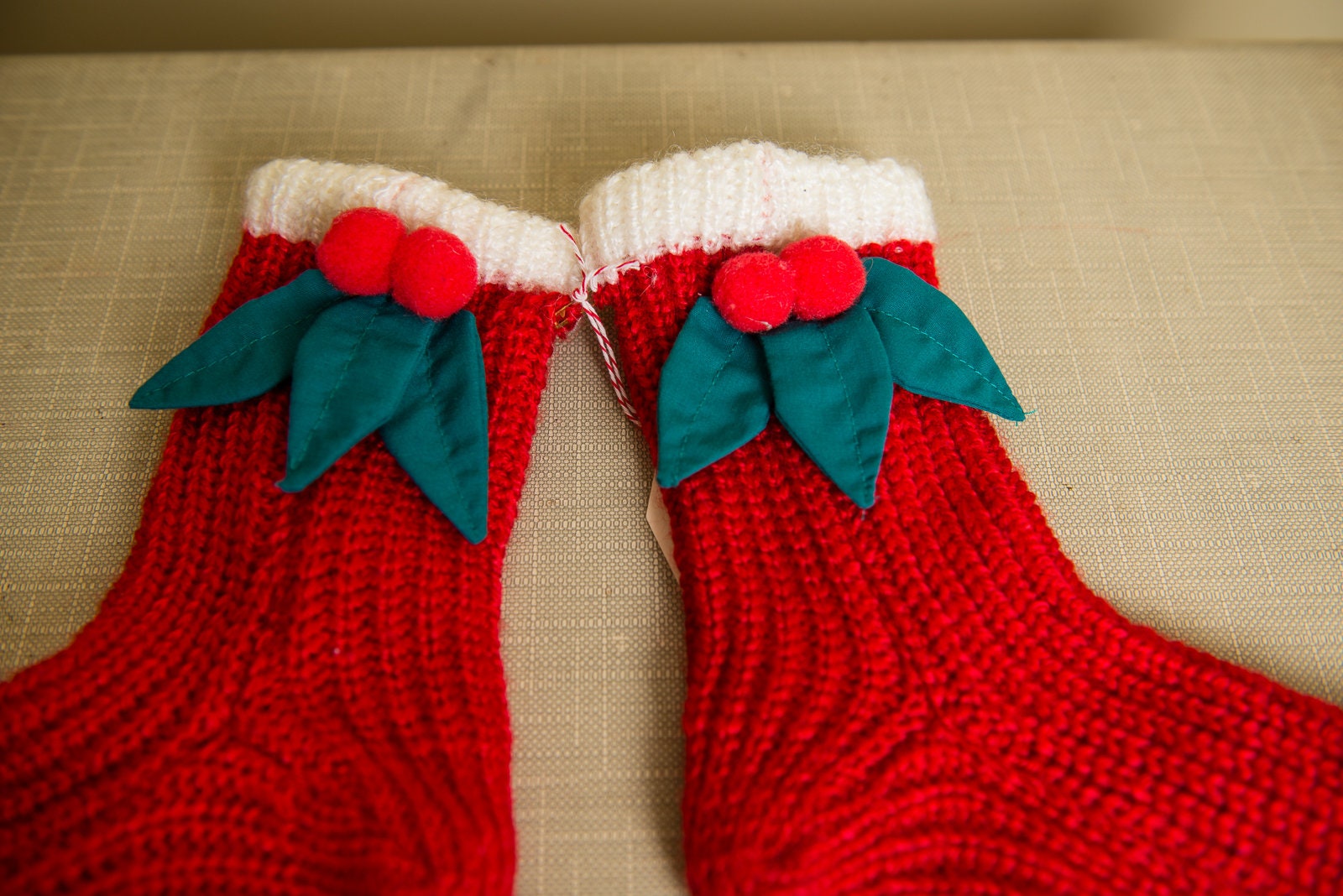 Women's warm knitted Christmas holiday holly berry slipper socks