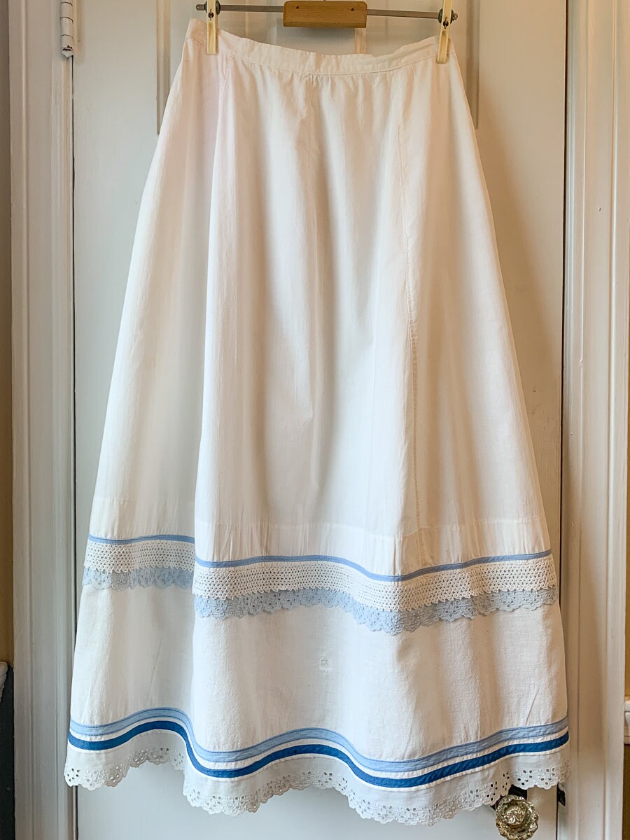 Victorian white cotton prairie skirt or petticoat with blue lace detail, assemblage peasant