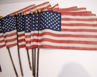 Vintage 7pc collection of hand-held American flags, 50 stars