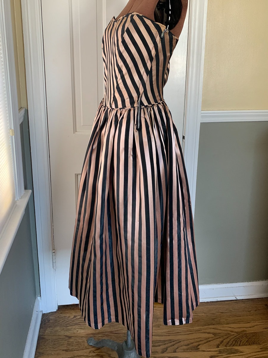 black dress with holes down the side