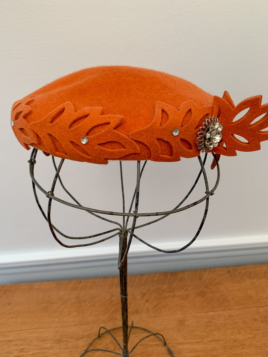 orange pillbox hat