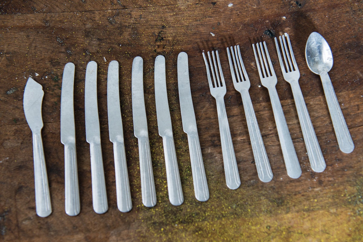 Vintage 12 piece 1950s aluminum children's miniature doll silverware