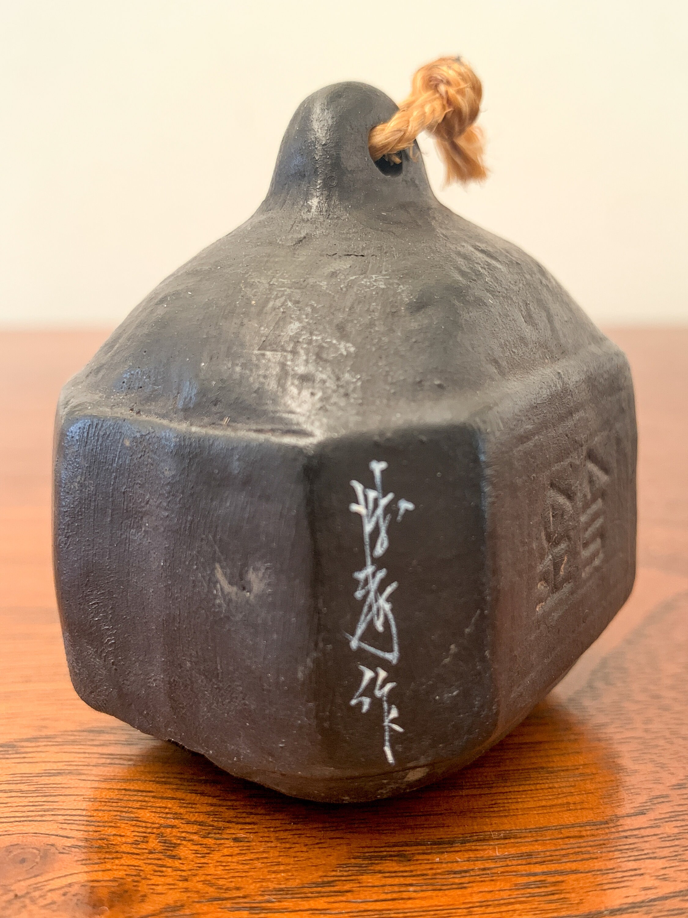 Vintage Japanese ceramic bell signed by artist, travel souvenir, lucky