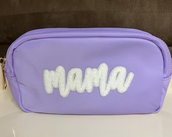 Neceser para mamá: Estuche morado para accesorios de viaje