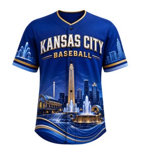 May include: A royal blue short-sleeved button-down baseball jersey featuring the text KANSAS CITY BASEBALL in white and gold lettering. The shirt displays a graphic of the Kansas City skyline, including the Liberty Memorial and fountains.