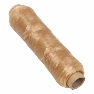 May include: A roll of natural-colored sausage casing, tightly wound around a cardboard tube. The casing has a slightly translucent appearance, with visible fibers and a light brown hue. The product is isolated on a white background.