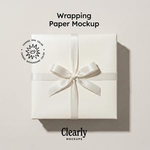 Mockup di carta da regalo: espositore per carta da regalo con oggetto intelligente, fiocco personalizzabile e sfondo (PSD)
