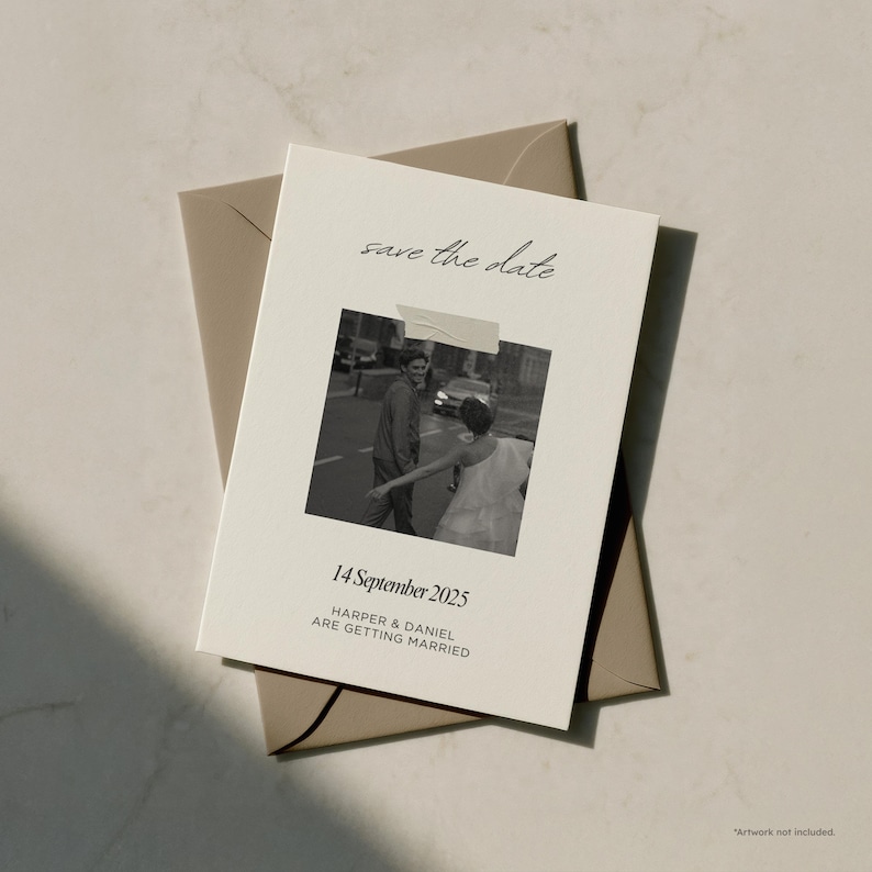 May include: A cream-colored save-the-date card with a black and white photo of a couple. The card includes the text "save the date," the date "14 September 2025," and the names "HARPER & DANIEL ARE GETTING MARRIED." The card is placed on a tan envelope.