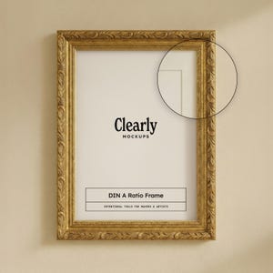 May include: A gold-colored, ornate picture frame with the text "Clearly Mockups" and "DIN A Ratio Frame". The frame has a detailed, textured design and is displayed against a neutral background.