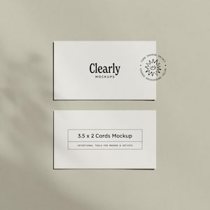 May include: Two white rectangular cards with the text "Clearly MOCKUPS" and "3.5 x 2 Cards Mockup". The cards are on a neutral background with a shadow effect and a small graphic that says "Turn Shadow On/Off Change Background Color".