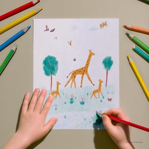 May include: A child's drawing of giraffes in a grassy field with trees and butterflies. The drawing is being colored with a red colored pencil. Various colored pencils, including red, yellow, blue, and green, are scattered around the drawing.